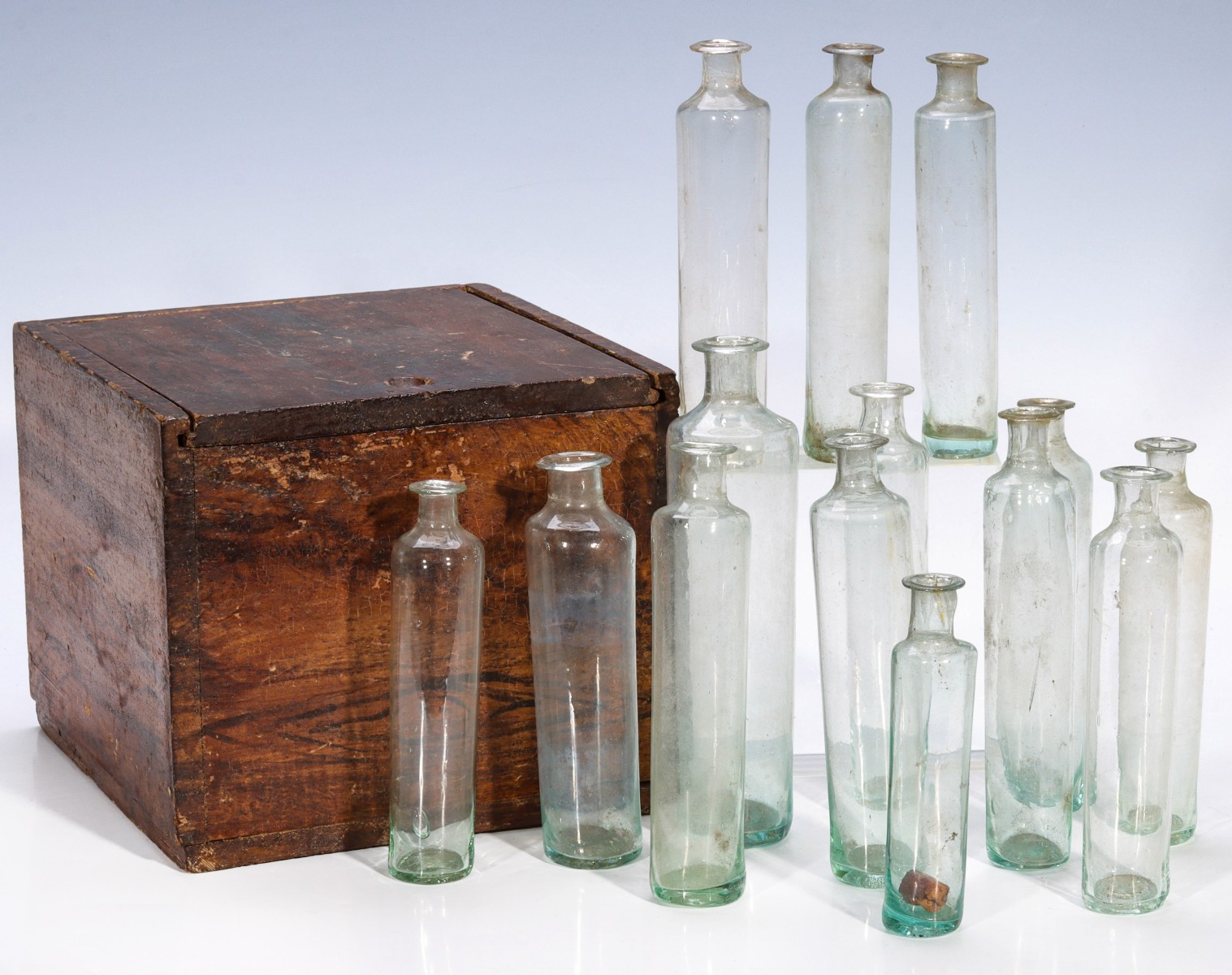 A 19C. GRAIN PAINTED BOX WITH BLOWN GLASS PILL BOTTLES